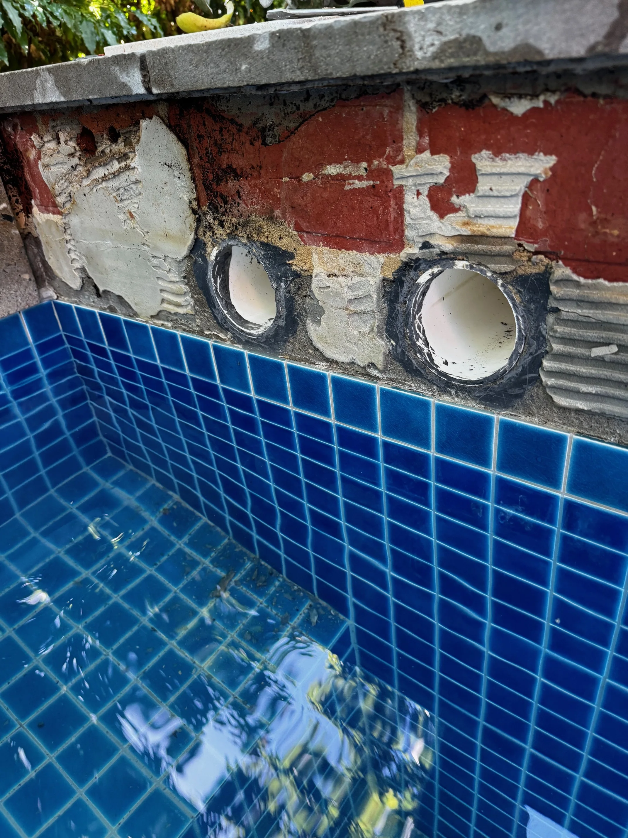 Structural access during a pool leak repair