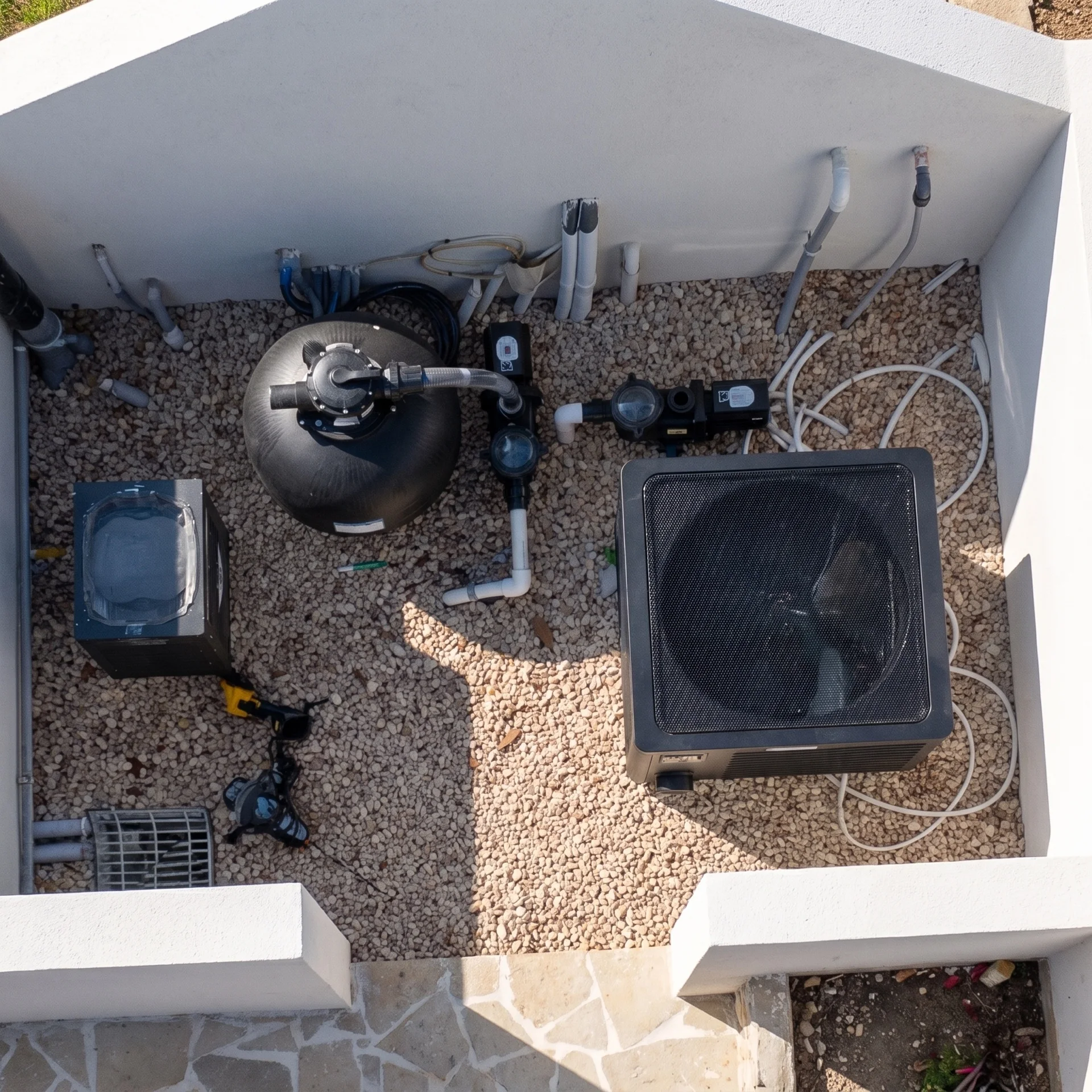 Overhead view of a pool equipment pad